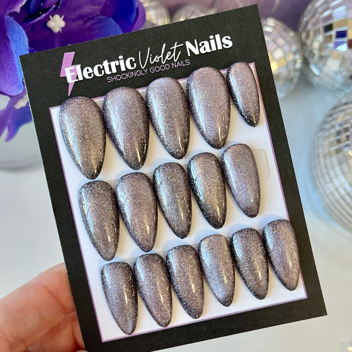 lavender cat eye press-on nails on medium almond shape